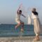 First trip abroad gender reveal by lovely couple at beachside | Adorable