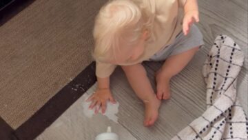 Fun-loving-baby-boy-turns-spilled-milk-mishap-into-a-cute.jpg