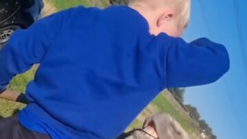 Boy-stays-calm-as-sneaky-horse-surprises-him-Super.jpg