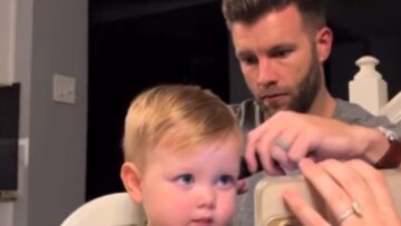 Dad-gives-baby-boy-adorable-bald-spot-during-messy-trim.jpg