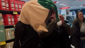 Elfs-Surprise-Girl-Pranks-Aunt-While-Christmas-Shopping-Try.jpg