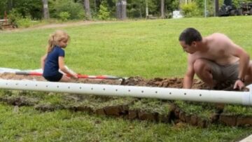 Little-Girl-Joins-Daddy-in-Digging-Gutter-Trenches-–-A.jpg