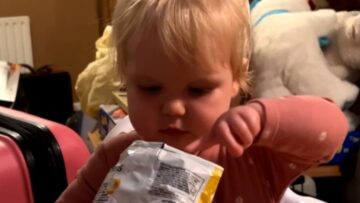 Surprise-Baby-girls-adorable-reaction-to-finding-crisp-in-empty.jpg