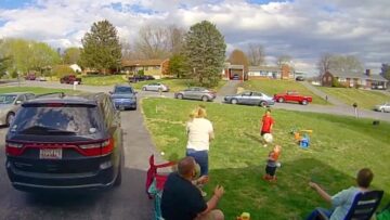 Ring-camera-captures-woman-playfully-knocking-down-toddler-with-ball.jpg