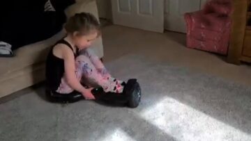 Super-Cute-Toddler-Hoverboarding-in-Spirals-Taking-a-Tumble.jpg