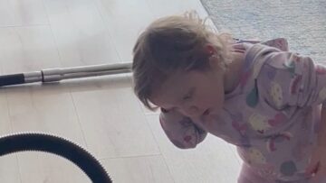 Sweet-toddler-dries-hair-with-Hoover-Vacuum-Adorable.jpg