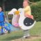 Adorable siblings have a blast on park spring riders | Cute