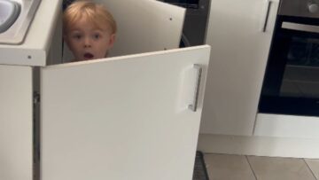 Mom-catches-adorable-little-boy-playing-with-sponges-in-the.jpg