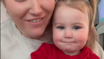 Joyful-Toddler-Giggles-with-Mom-A-Delightful-Face-and-Sound.jpg